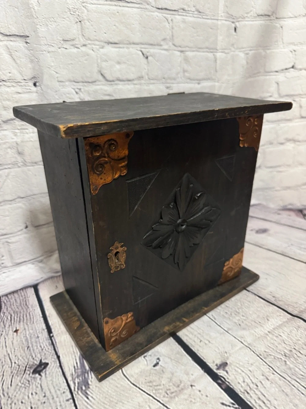 Spiritual Herb Wicken Decorative Black Wooden Cabinet with Copper Accents